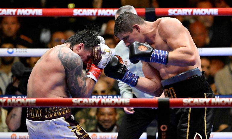 Usyk survives scare to stop Verhoeven in dramatic 11th round.